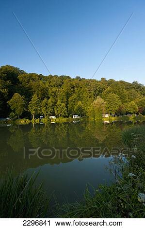 Stock Image - France, Normandy, Camping beside lake; Le Brevedent. Fotosearch
