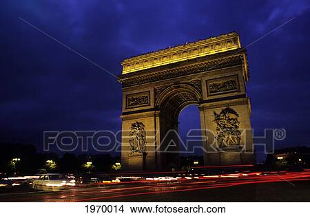 Picture - France, Paris, Place De L'+Toile, Arc De Triumphe Illuminated At Twilight, Blurred Traffic Lights.. Fotosearch