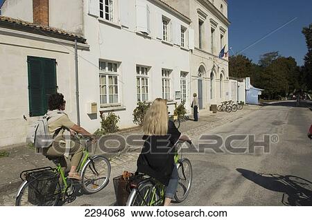 Stock Photo - France, Poitou-Charentes, Cycling around D'Aix Island; Charente-Maritime. Fotosearch