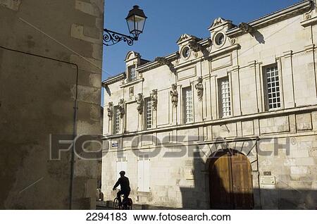 Stock Image - France, Poitou-Charentes, Maison Nicolas Venette. 17th century house of Dr Nicolas Venette is noted for its unusual facade ornaments with busts of physicians showing close links between medicine and religion of time; La Rochelle. Fotosearch