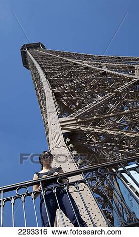France, Woman enjoying view from Eiffel Tower; Paris View Large Photo Image Stock Photograph - France, Woman enjoying view from Eiffel Tower; Paris. Fotosearch