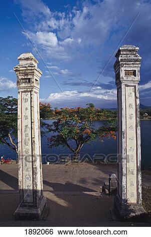 Stock Photograph - Free Standing Pillars At Thien Mu Pagoda. Fotosearch