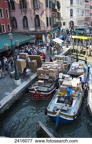 Stock Photo - Freight and commerce along the Grand Canal; Venice, Italy. Fotosearch