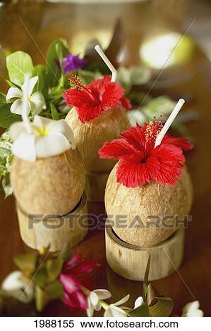 Stock Photography - French Polynesia, Bora Bora, Close-Up Of A Refreshing Tropical Cocktails In Coconut Cups. Fotosearch