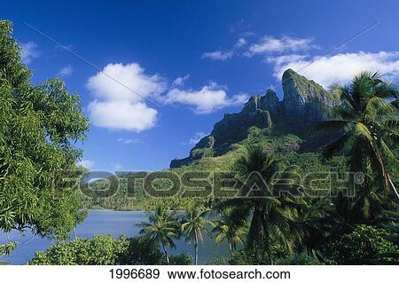 Stock Photo - French Polynesia, Bora Bora, Coastal Shot, Mountains With Water A56A. Fotosearch