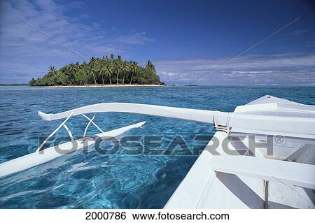 Stock Photograph - French Polynesia, Bora Bora, Motu And Outrigger Canoe In Clear Waters. Fotosearch