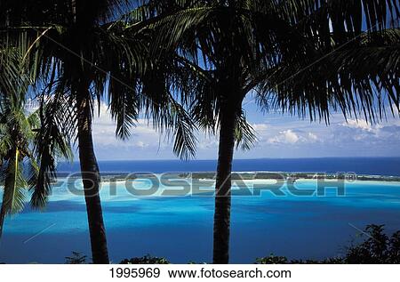 Stock Photo - French Polynesia, Bora Bora, View From Shore Of Lagoon And Sand Islands In Distance.. Fotosearch