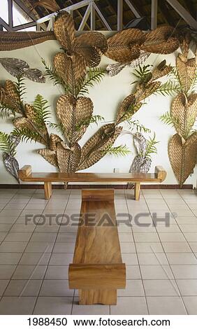 Stock Image - French Polynesia, Huahine, Weaved Palm Fans Decorate The Airport Terminal Walls. Fotosearch