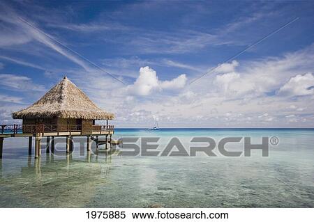 French Polynesia, Moorea Lagoon Resort, Bungalows Over Beautiful Turquoise Ocean. View Large Photo Image Stock Photography - French Polynesia, Moorea Lagoon Resort, Bungalows Over Beautiful Turquoise Ocean.. Fotosearch