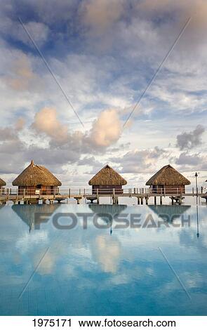 French Polynesia, Pearl Resort, Bungalows Over Beautiful Turquoise Ocean. View Large Photo Image Stock Image - French Polynesia, Pearl Resort, Bungalows Over Beautiful Turquoise Ocean.. Fotosearch