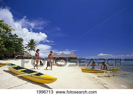 French Polynesia, Tahiti, Bali Hai Resort, Tourist Couples On Beach, Canoe. A57B. Editorial Use Only. View Large Photo Image Stock Image - French Polynesia, Tahiti, Bali Hai Resort, Tourist Couples On Beach, Canoe. A57B. Editorial Use Only.. Fotosearch