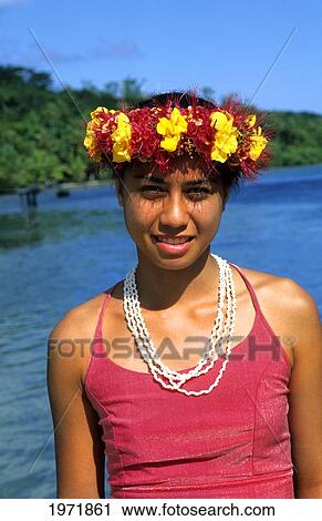 Stock Image - French Polynesia, Tahiti, Bora Bora, Headshot Of A Young Tahitian Girl Wearing Traditional Headwear.. Fotosearch
