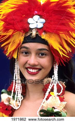 Stock Image - French Polynesia, Tahiti, Bora Bora, Headshot Of A Beautiful Tahitian Dancer In Headdress.. Fotosearch