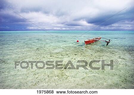 French Polynesia, Tahiti, Bora Bora, Red Outrigger Canoe In Calm Turquoise Water. View Large Photo Image Stock Photo - French Polynesia, Tahiti, Bora Bora, Red Outrigger Canoe In Calm Turquoise Water.. Fotosearch