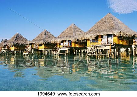 French Polynesia, Tahiti, Bora Bora, Bungalows Of The Hotel Moana Beach, View From Ocean View Large Photo Image Stock Photo - French Polynesia, Tahiti, Bora Bora, Bungalows Of The Hotel Moana Beach, View From Ocean. Fotosearch