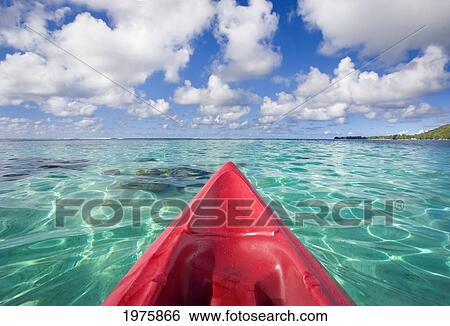 Stock Photograph - French Polynesia, Tahiti, Bora Bora, Red Outrigger Canoe In Calm Turquoise Water.. Fotosearch