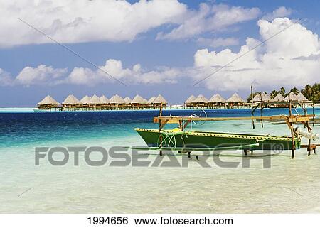 French Polynesia, Tahiti, Bora Bora, Moana Beach Hotel Bungalows, Fishing Boat Along Shore View Large Photo Image Stock Photograph - French Polynesia, Tahiti, Bora Bora, Moana Beach Hotel Bungalows, Fishing Boat Along Shore. Fotosearch