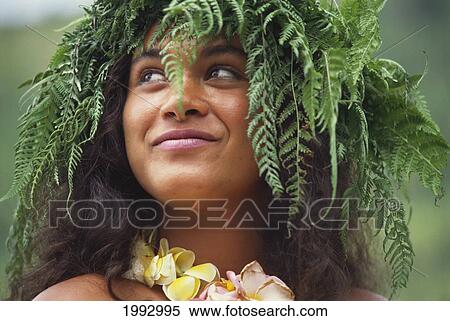 Stock Photography - French Polynesia, Tahiti, Bora Bora, Portrait Of Local Woman With Fern Lei.. Fotosearch