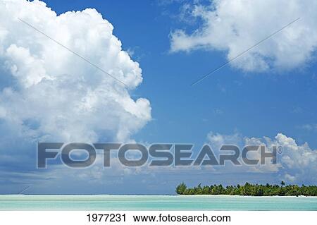 Stock Image - French Polynesia, Tahiti, Lagoon Beach With Blue Sky; Maupiti. Fotosearch