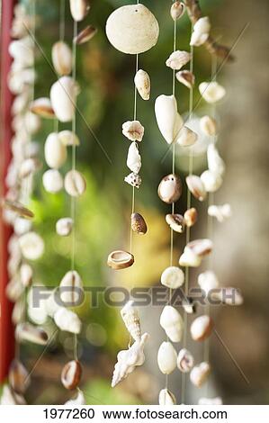 Stock Image - French Polynesia, Tahiti, Maupiti, Hand Crafted Wind Chimes.. Fotosearch