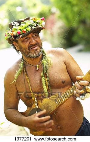 Stock Image - French Polynesia, Tahiti, Maupiti, Local Women In Yard.. Fotosearch