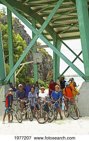 French Polynesia, Tahiti, Maupiti, Young School Boys With Bicycles. View Large Photo Image Stock Photo - French Polynesia, Tahiti, Maupiti, Young School Boys With Bicycles.. Fotosearch