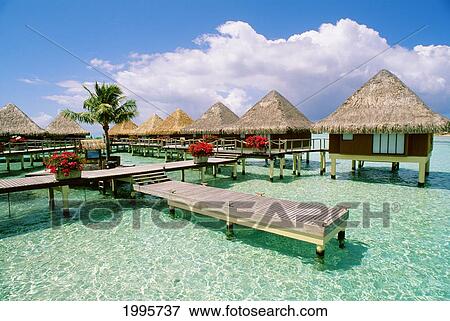 French Polynesia, Tahiti, Moana Beach Park Royal Resort, Bungalows Over Ocean View Large Photo Image Stock Photo - French Polynesia, Tahiti, Moana Beach Park Royal Resort, Bungalows Over Ocean. Fotosearch