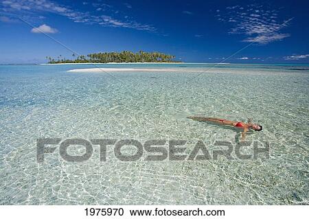 French Polynesia, Tahiti, Rangiroa, Woman Floating In Water. View Large Photo Image Stock Image - French Polynesia, Tahiti, Rangiroa, Woman Floating In Water.. Fotosearch