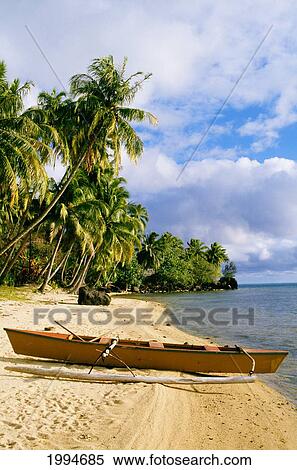 Stock Photography - French Polynesia, Tahiti, White Sand Beach With Palm Trees And Canoe. Fotosearch