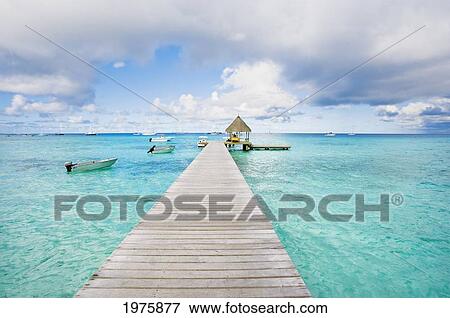 French Polynesia, Tuamotu Isalnds, Rangiroa Atoll, Pier On The Ocean. View Large Photo Image Stock Photo - French Polynesia, Tuamotu Isalnds, Rangiroa Atoll, Pier On The Ocean.. Fotosearch