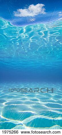 French Polynesia, Underwater Sandy Bottom And Surface Reflection With Cloud. View Large Photo Image Stock Photograph - French Polynesia, Underwater Sandy Bottom And Surface Reflection With Cloud.. Fotosearch