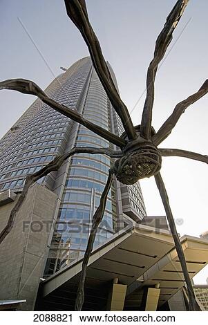 French Sculpture 'maman' At Roppongi Hills With The Tower Seen Behind; Tokyo, Japan View Large Photo Image Stock Image - French Sculpture 'maman' At Roppongi Hills With The Tower Seen Behind; Tokyo, Japan. Fotosearch