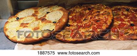 Fresh Baked Focaccia Bread At Di Gesu Bakers, Just Out Of The Wood Fired Pizza Oven. View Large Photo Image Stock Photography - Fresh Baked Focaccia Bread At Di Gesu Bakers, Just Out Of The Wood Fired Pizza Oven.. Fotosearch