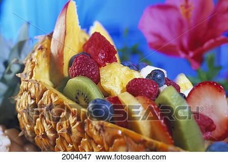 Fresh Fruit Salad Served In Half Pineapple, Colorful Variety, Hibiscus Flower Background View Large Photo Image Stock Photo - Fresh Fruit Salad Served In Half Pineapple, Colorful Variety, Hibiscus Flower Background. Fotosearch