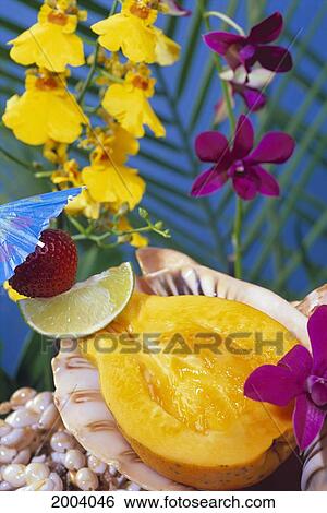 Fresh Half Papaya Served In Shell Strawberry Lime Garnish Orchids Background, Colorful View Large Photo Image Stock Photograph - Fresh Half Papaya Served In Shell Strawberry Lime Garnish Orchids Background, Colorful. Fotosearch
