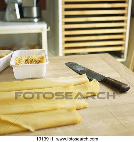 Fresh Pasta To Make Tagliatelli View Large Photo Image Stock Image - Fresh Pasta To Make Tagliatelli. Fotosearch