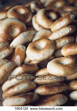 Freshly Baked Bagel-Like Bread For Sale, Kashgar, Xinjiang, China. View Large Photo Image Stock Photo - Freshly Baked Bagel-Like Bread For Sale, Kashgar, Xinjiang, China.. Fotosearch