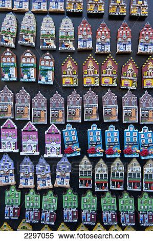 Stock Photography - Fridge Magents In Shape Of Traditional Gabled Dutch Houses For Sale In Amsterdam, Holland.. Fotosearch