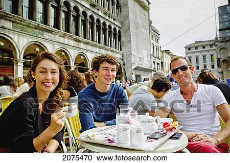 Friends Enjoying Coffee On Saint Mark's Square; Venice Italy View Large Photo Image Stock Image - Friends Enjoying Coffee On Saint Mark's Square; Venice Italy. Fotosearch