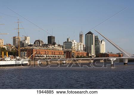 Stock Photography - Frigate Presidente Sarmiento Boat-Museum and Santiago Calatrava's Puente de La Mujer (Women's Bridge) in Puerto Madero, Buenos Aires, Capital Federal, Argentina. Fotosearch