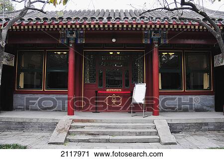 Stock Image - Front Entrance To A Building With Red Architectural Detail; Beijing China. Fotosearch