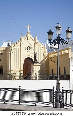 Front Of A Church Building With A Cross At The Peak Of The Roof; Chiclana De La Frontera Andalusia Spain View Large Photo Image Stock Photo - Front Of A Church Building With A Cross At The Peak Of The Roof; Chiclana De La Frontera Andalusia Spain. Fotosearch
