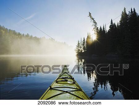 Front Of Kayak On Rushing River; Kenora Ontario Canada View Large Photo Image Stock Photograph - Front Of Kayak On Rushing River; Kenora Ontario Canada. Fotosearch