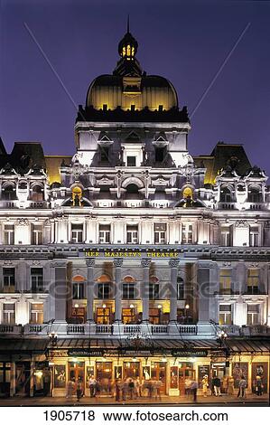 Stock Photo - Front view of illuminated Her Majesty's Theatre, London, England. Fotosearch
