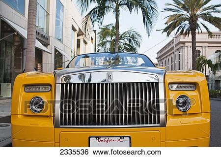Stock Photograph - Front View Of Yellow Limousine; California, Usa. Fotosearch