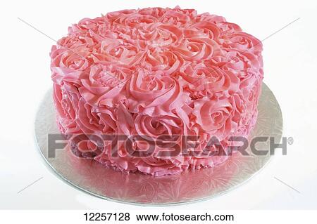 Stock Photo - Frosted pink cake in floral design. Fotosearch