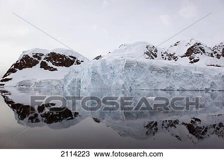 Frozen Coastline Reflected In The Southern Ocean; Antarctica View Large Photo Image Stock Image - Frozen Coastline Reflected In The Southern Ocean; Antarctica. Fotosearch
