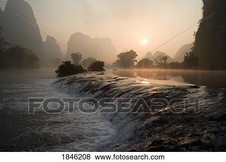 Frozen Pond In Mountain Area; Yulong River, Yangshuo, China View Large Photo Image Stock Photo - Frozen Pond In Mountain Area; Yulong River, Yangshuo, China. Fotosearch