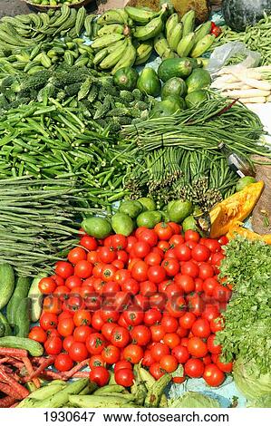 Fruit and veg for sale on street next to New Market near Sudder Street, a popular backpacker budget accommodation district of Calcutta / Kolkata, the capital of West Bengal State, India, Asia. View Large Photo Image Stock Photo - Fruit and veg for sale on street next to New Market near Sudder Street, a popular backpacker budget accommodation district of Calcutta / Kolkata, the capital of West Bengal State, India, Asia.. Fotosearch