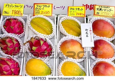 Stock Image - Fruit On Kokusai Street; Naha City, Okinawa Island, Japan. Fotosearch